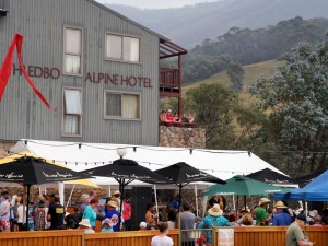People congregating outside the Thredbo Alpine Hotel